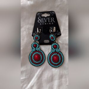 Beautiful silver strike native earrings